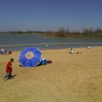 At the beach swimming.