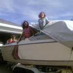 Girls playing in the boat.