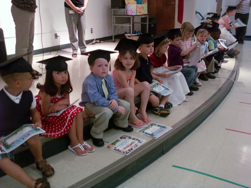 Sitting next to her buddy.
